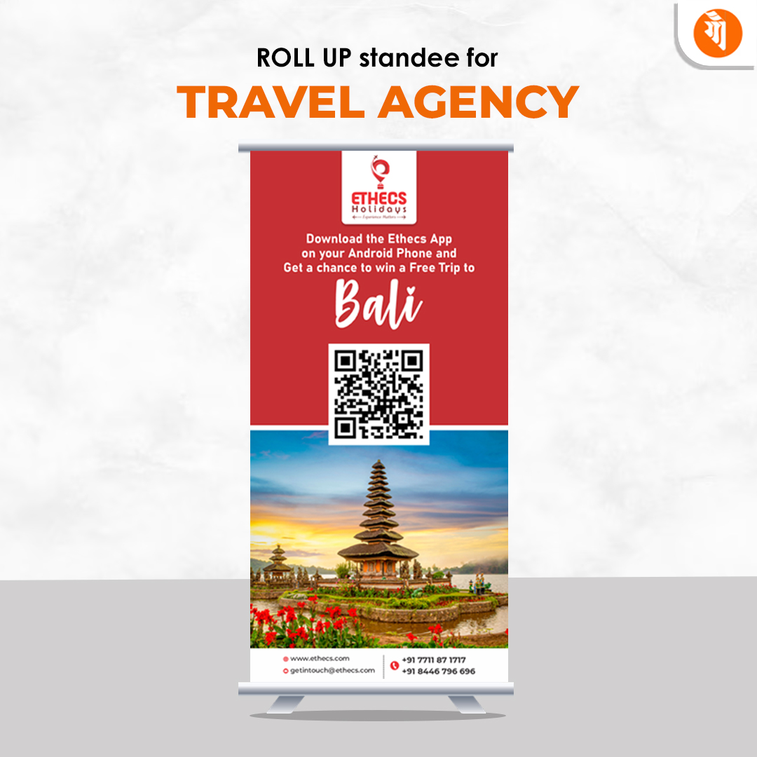 Travel agency roll-up standee designed by Gaurang Graphics featuring a travel image, agency logo, contact information, and travel-related messaging.